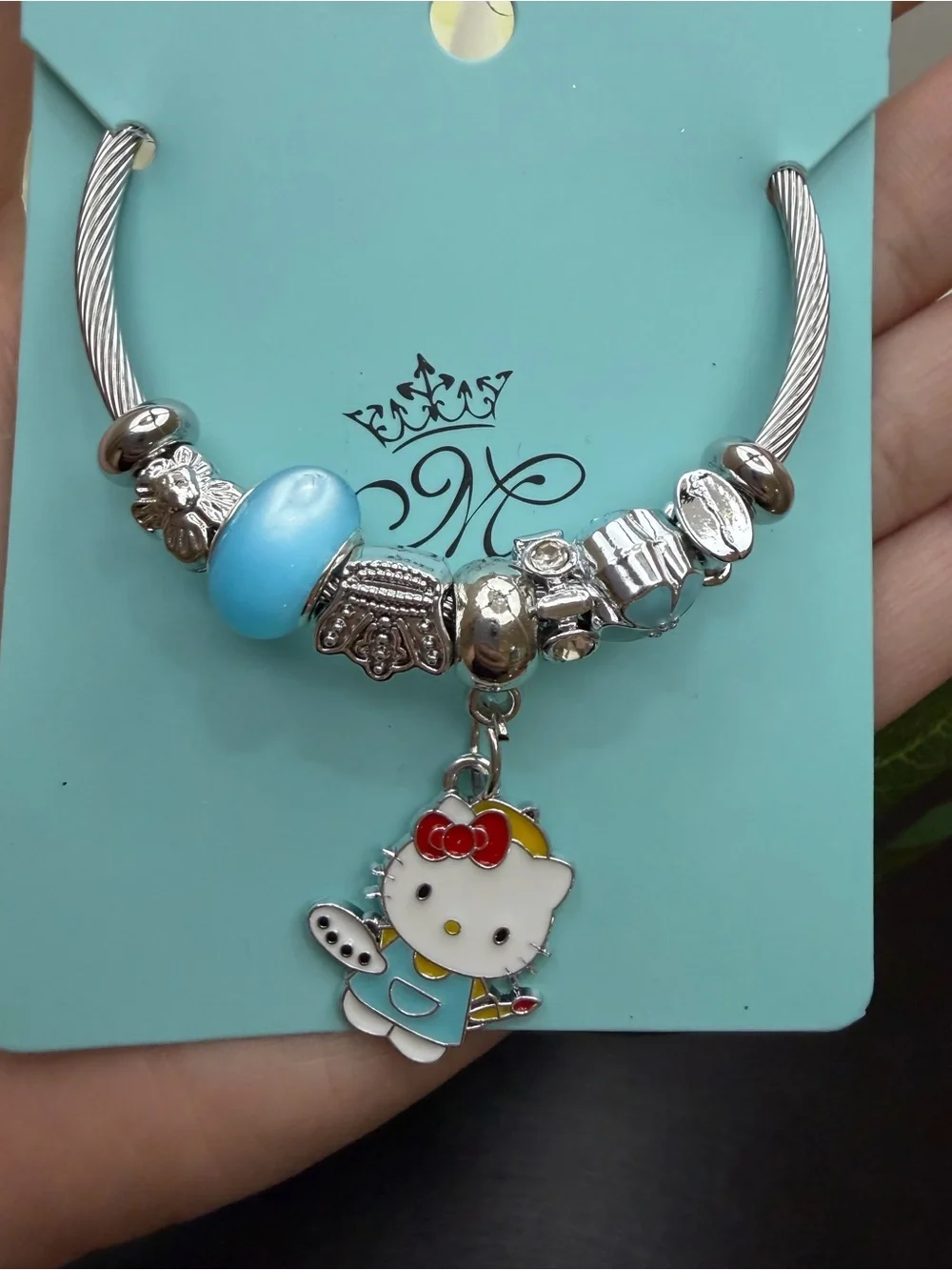 Silver Cable Charm Bangle with Blue Flower Beads and Hello Kitty Charm